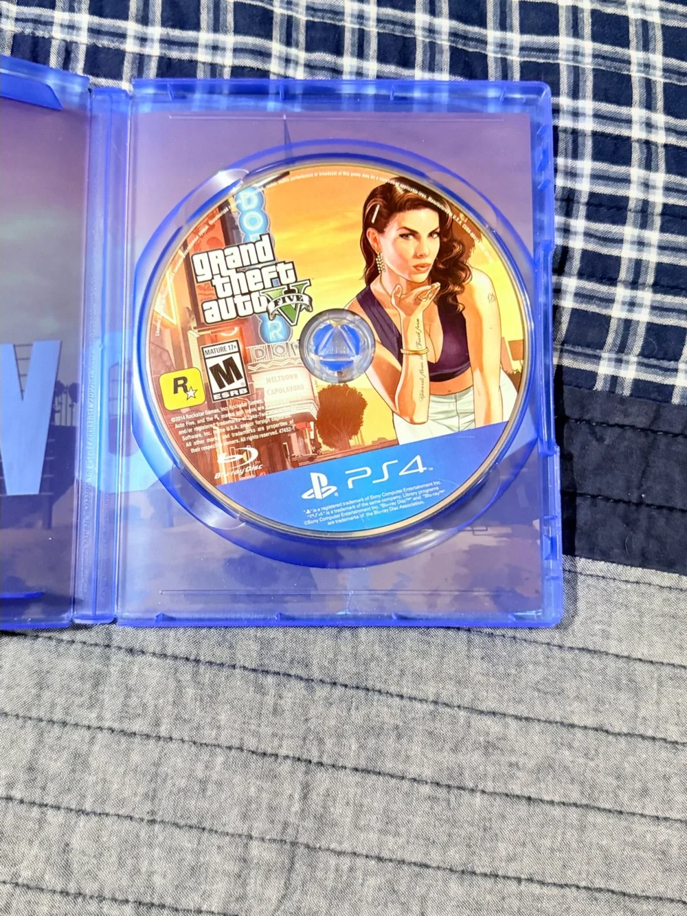 Grand Theft Auto V (PS4) – Blue Case by Rockstar Games